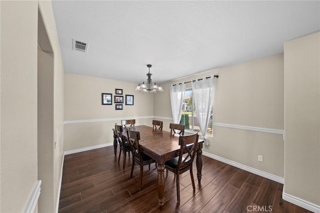 27876 Twilight Ct, Murrieta, CA 92563 - dining area with dark wood finished floors and a chandelier
