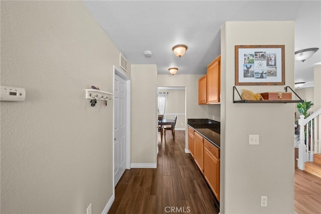 27876 Twilight Ct, Murrieta, CA 92563 - hall with dark wood-type flooring and baseboards