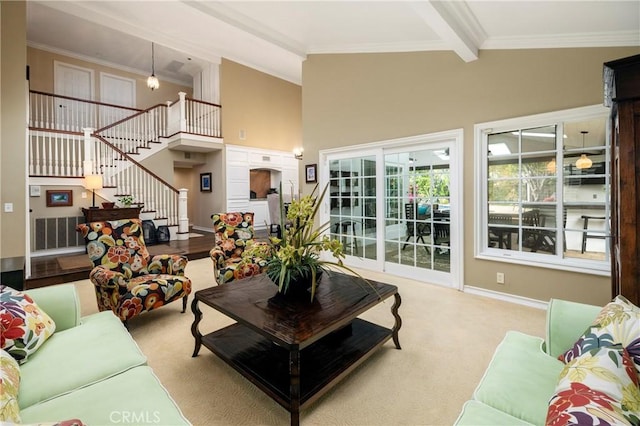 living area with carpet floors, stairway, crown molding, high vaulted ceiling, and beam ceiling