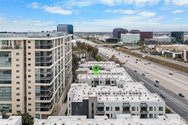 view of urban area featuring a main thoroughfare