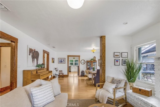 living area with light wood-style flooring