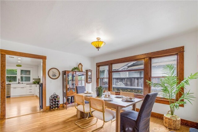 dining room featuring light wood-style flooring