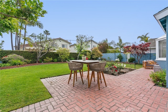 view of patio featuring outdoor dining area