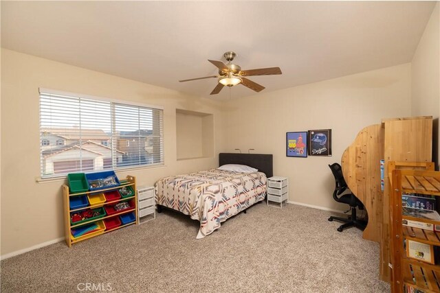 bedroom featuring carpet, baseboards, and ceiling fan