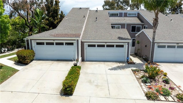 33156 Ocean Bright, Dana Point, CA 92629 - view of front of home featuring concrete driveway, roof with shingles, and an attached garage