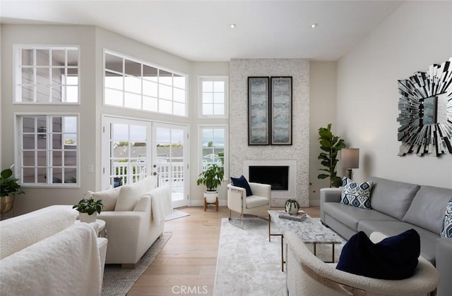 33156 Ocean Bright, Dana Point, CA 92629 - living room with light wood finished floors, a large fireplace, and recessed lighting
