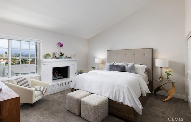 33156 Ocean Bright, Dana Point, CA 92629 - carpeted bedroom with vaulted ceiling and a brick fireplace