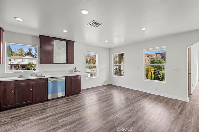 28637 Chiquito Canyon Rd, Castaic, CA 91384 - kitchen with dishwasher, a sink, dark wood-type flooring, light countertops, and healthy amount of natural light