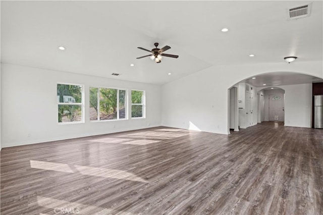 28637 Chiquito Canyon Rd, Castaic, CA 91384 - unfurnished living room featuring a ceiling fan, wood finished floors, recessed lighting, arched walkways, and vaulted ceiling