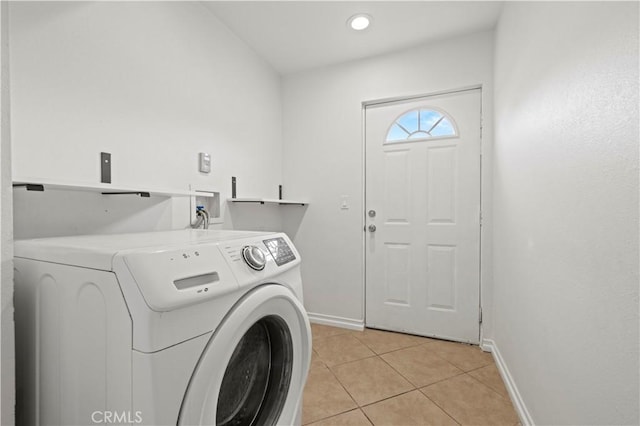 28637 Chiquito Canyon Rd, Castaic, CA 91384 - washroom with washer / dryer, baseboards, and light tile patterned floors