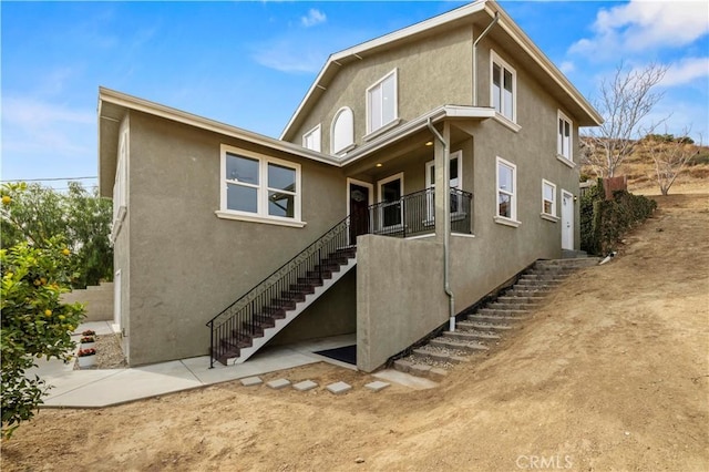 28637 Chiquito Canyon Rd, Castaic, CA 91384 - back of property featuring stairway and stucco siding