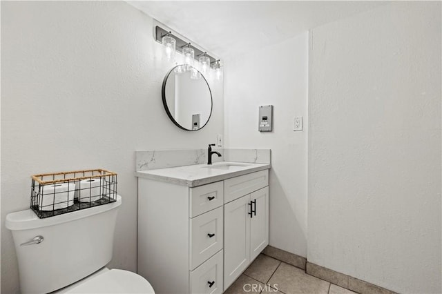 28637 Chiquito Canyon Rd, Castaic, CA 91384 - half bathroom featuring tile patterned floors, toilet, vanity, and baseboards