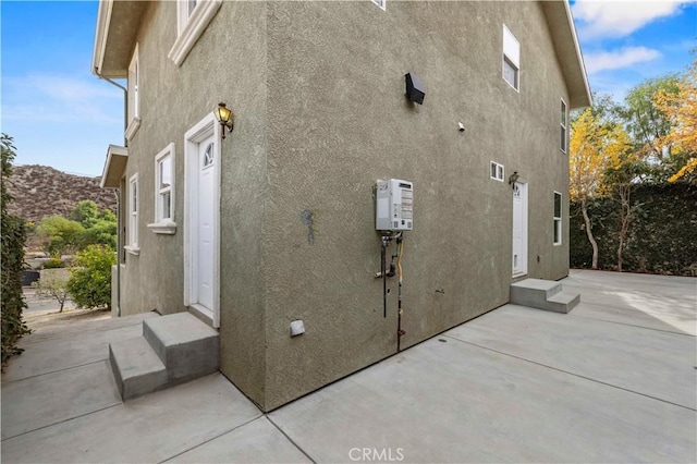 28637 Chiquito Canyon Rd, Castaic, CA 91384 - view of home's exterior featuring stucco siding and a patio area
