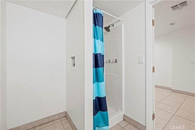28637 Chiquito Canyon Rd, Castaic, CA 91384 - full bath featuring tile patterned flooring, a stall shower, and baseboards