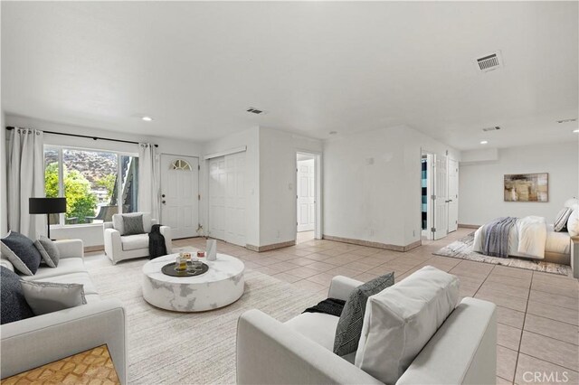 28637 Chiquito Canyon Rd, Castaic, CA 91384 - living room with light tile patterned floors, recessed lighting, and baseboards