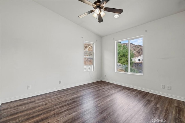 28637 Chiquito Canyon Rd, Castaic, CA 91384 - unfurnished room with lofted ceiling, dark wood-style flooring, baseboards, and a ceiling fan