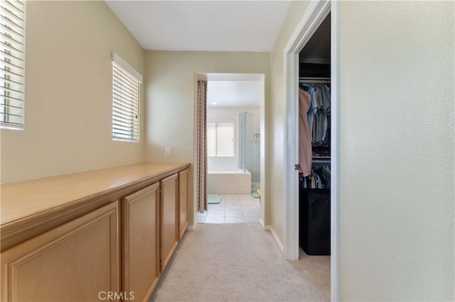27952 Agapanthus Ln, Valencia, CA 91354 - hall featuring light colored carpet, healthy amount of natural light, and baseboards