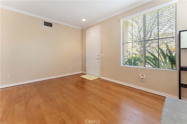 27952 Agapanthus Ln, Valencia, CA 91354 - spare room with wood finished floors, baseboards, crown molding, and recessed lighting