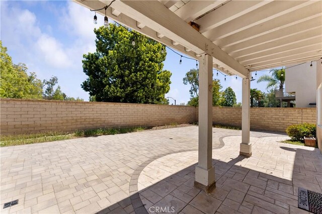 27952 Agapanthus Ln, Valencia, CA 91354 - view of patio with a fenced backyard