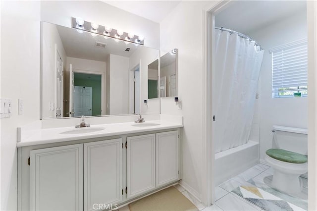 27952 Agapanthus Ln, Valencia, CA 91354 - full bathroom with double vanity, toilet, shower / bath combination with curtain, and baseboards