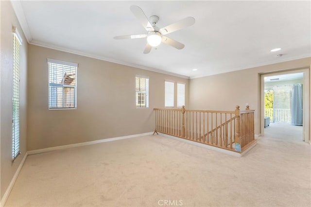 27952 Agapanthus Ln, Valencia, CA 91354 - empty room with ornamental molding, carpet floors, baseboards, and healthy amount of natural light