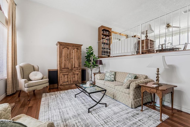 living room with wood finished floors and baseboards