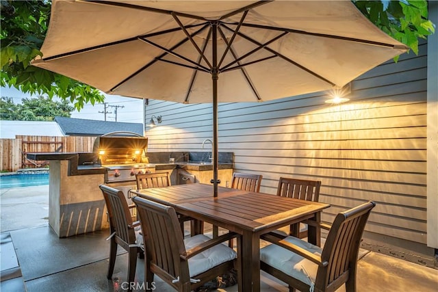 917 N Dalton Ave, Azusa, CA 91702 - view of patio / terrace featuring a grill, a fenced backyard, area for grilling, and outdoor dining space