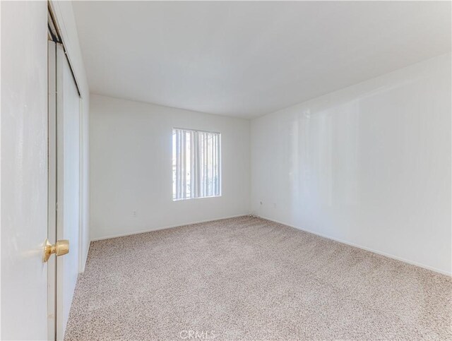 2726 W Orion Ave, Santa Ana, CA 92704 - spare room with carpet floors and baseboards