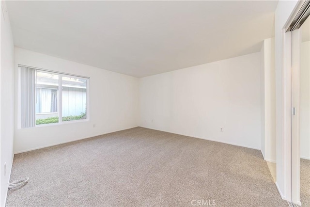 2726 W Orion Ave, Santa Ana, CA 92704 - carpeted spare room featuring baseboards