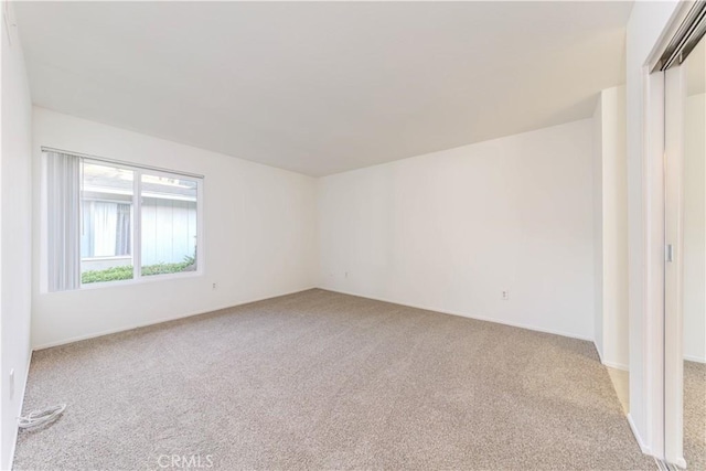 2726 W Orion Ave, Santa Ana, CA 92704 - carpeted spare room featuring baseboards