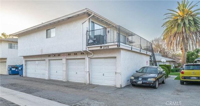 2726 W Orion Ave, Santa Ana, CA 92704 - view of property exterior with a balcony and stucco siding