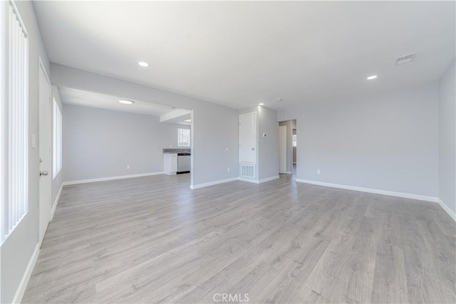 2726 W Orion Ave, Santa Ana, CA 92704 - unfurnished living room featuring light wood finished floors and recessed lighting