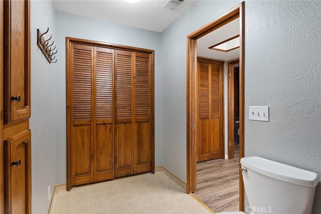 14177 Racine Cir, Magalia, CA 95954 - bathroom featuring toilet and a closet