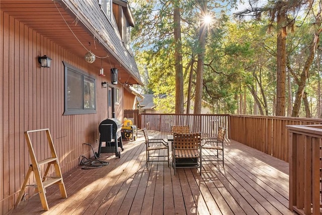 14177 Racine Cir, Magalia, CA 95954 - wooden deck with outdoor dining space and grilling area