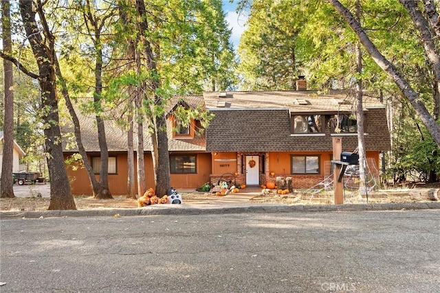 14177 Racine Cir, Magalia, CA 95954 - colonial inspired home with a chimney and roof with shingles