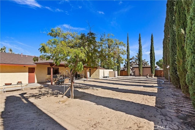 20407 Eyota Ln, Apple Valley, CA 92308 - view of yard featuring a patio area and fence