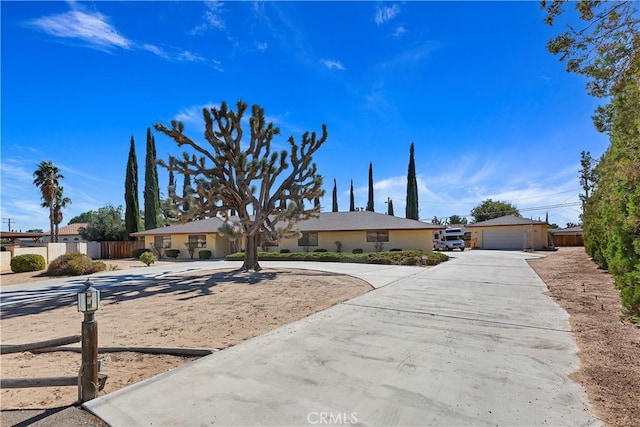 20407 Eyota Ln, Apple Valley, CA 92308 - ranch-style home featuring a detached garage and fence