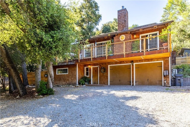 7900 San Clemente Ave, Atascadero, CA 93422 - view of front of house with a garage, a chimney, driveway, and a wooden deck