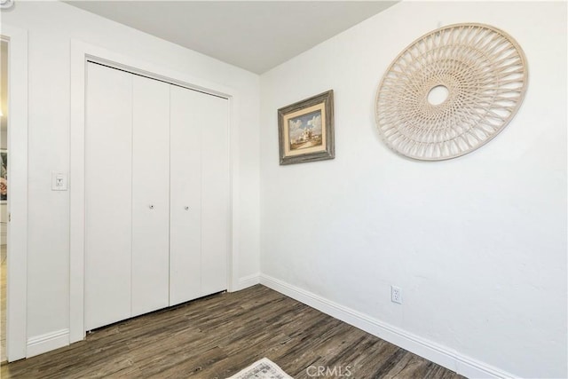 7900 San Clemente Ave, Atascadero, CA 93422 - unfurnished bedroom with wood finished floors, baseboards, and a closet