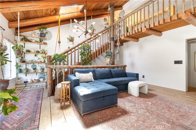 7900 San Clemente Ave, Atascadero, CA 93422 - living room featuring wooden ceiling with exposed beams, hardwood / wood-style floors, stairway, and a chandelier
