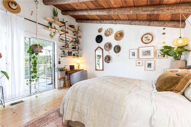 7900 San Clemente Ave, Atascadero, CA 93422 - bedroom featuring wooden ceiling with exposed beams, access to exterior, and light wood-style floors