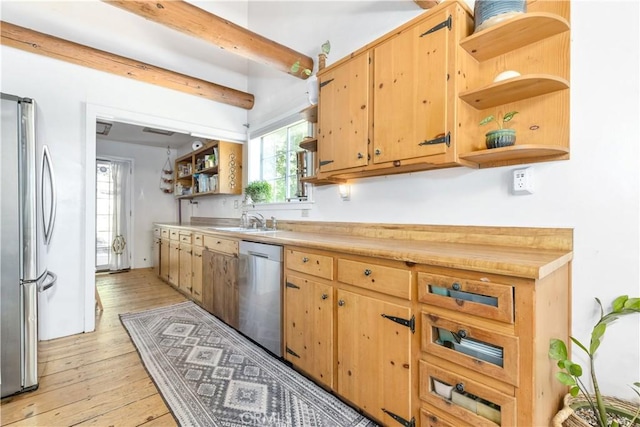 7900 San Clemente Ave, Atascadero, CA 93422 - kitchen with open shelves, stainless steel appliances, a sink, light wood-style floors, and light countertops