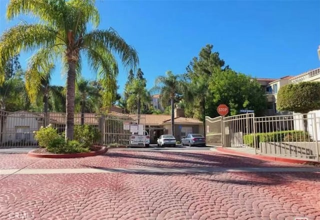 view of front of house featuring a gate and fence