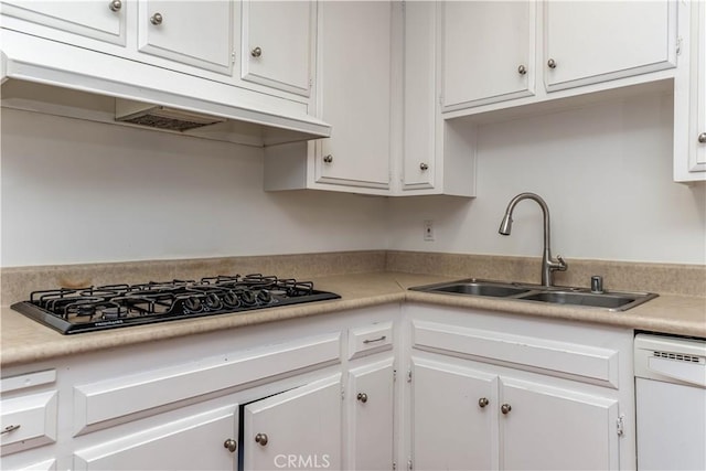 2619 W Aurora St, Santa Ana, CA 92704 - kitchen with dishwasher, black gas stovetop, under cabinet range hood, white cabinets, and light countertops