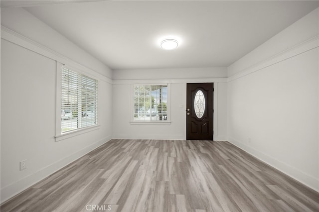 29 W Zane St, Long Beach, CA 90805 - foyer with light wood-type flooring and baseboards