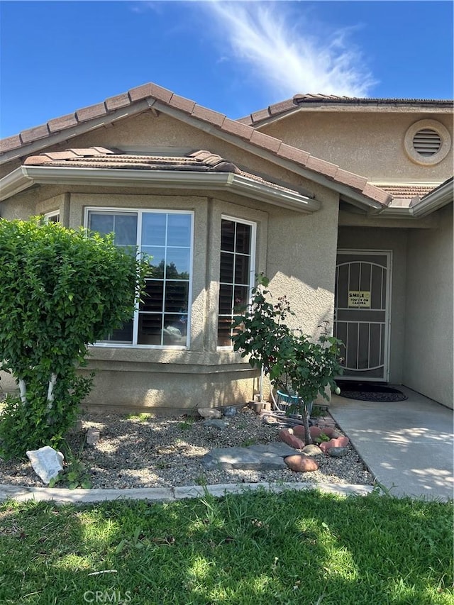 228 Pisa Ct, Merced, CA 95341 - view of side of property featuring stucco siding