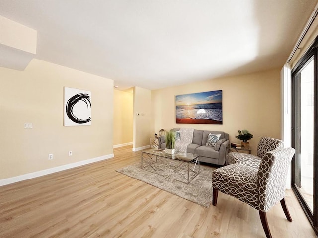 13272 Wimberly Sq Unit 219, San Diego, CA 92128 - living room with light wood finished floors and baseboards