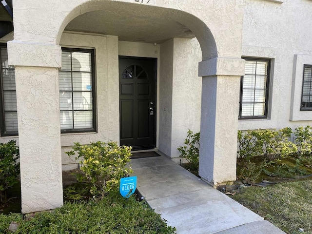 13272 Wimberly Sq Unit 219, San Diego, CA 92128 - property entrance with stucco siding
