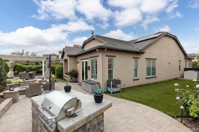 3482 Corte Fortuna, Carlsbad, CA 92009 - rear view of house with area for grilling, a patio, a lawn, and stucco siding