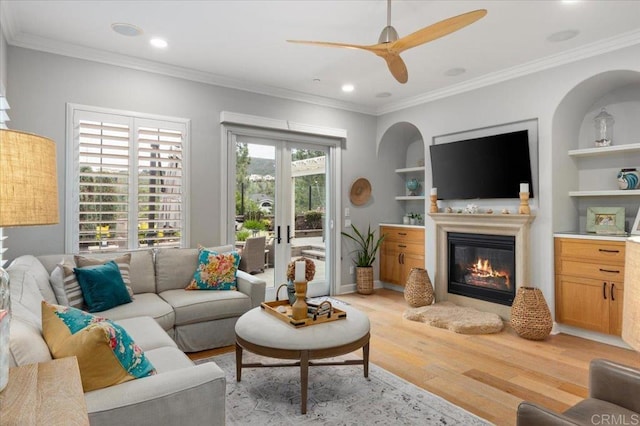 3482 Corte Fortuna, Carlsbad, CA 92009 - living room with light wood-style floors, a glass covered fireplace, ornamental molding, ceiling fan, and recessed lighting